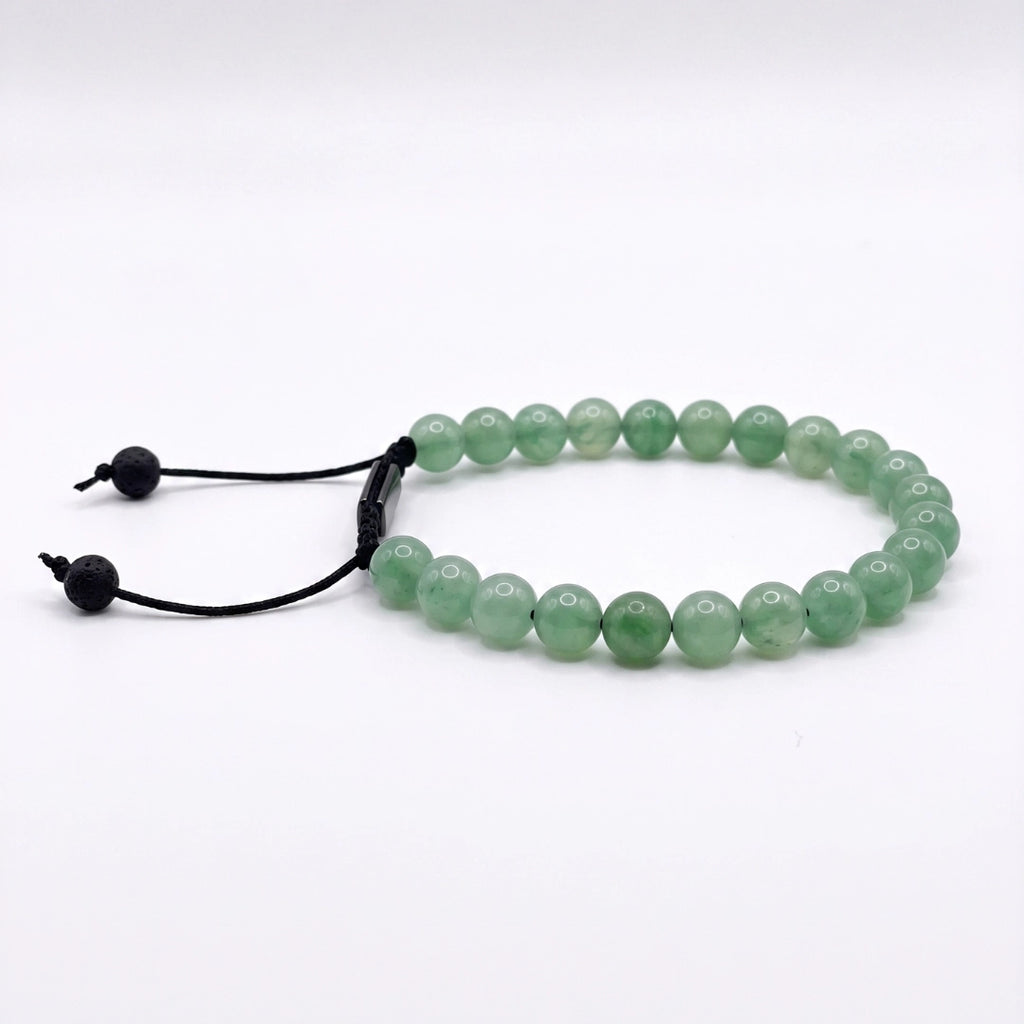 Pulsera minimalista de piedras de aventurina natural con nudo corredizo y espaciador metálico de la marca KRV.