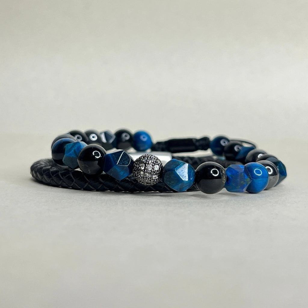 Pulsera delgada para hombre en cuero natural trenzado negro de 5 mm con cierre de acero.