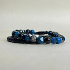 Pulsera delgada para hombre en cuero natural trenzado negro de 5 mm con cierre de acero.