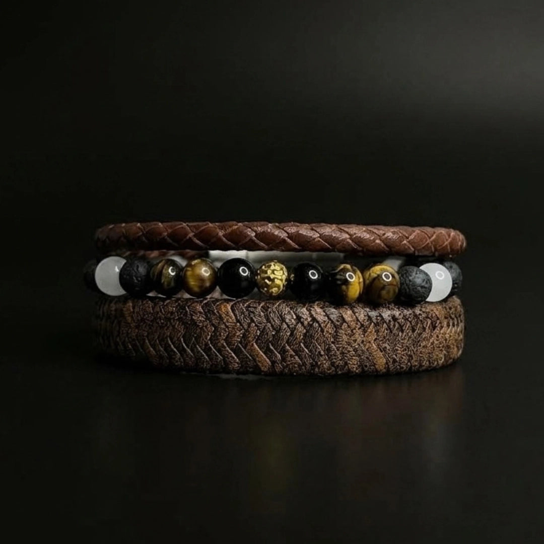 Pack de 3 pulseras para hombre en cuero marrón camuflado, cuero trenzado y piedras naturales ojo de tigre.

Detalle de Pulsera de Piedras Naturales: