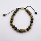 Pulsera ojo de tigre KRV.CO con placa metálica grabada y cordón ajustable