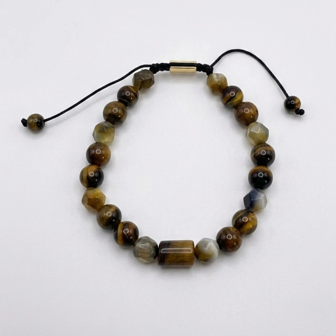 Pulsera ojo de tigre KRV.CO con placa metálica grabada y cordón ajustable