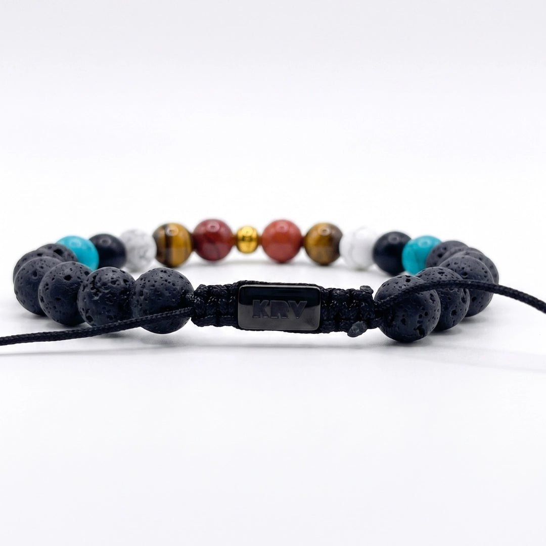 Logo KRV con nudo corredizo en  pulsera de piedras naturales con variedad de piedras 