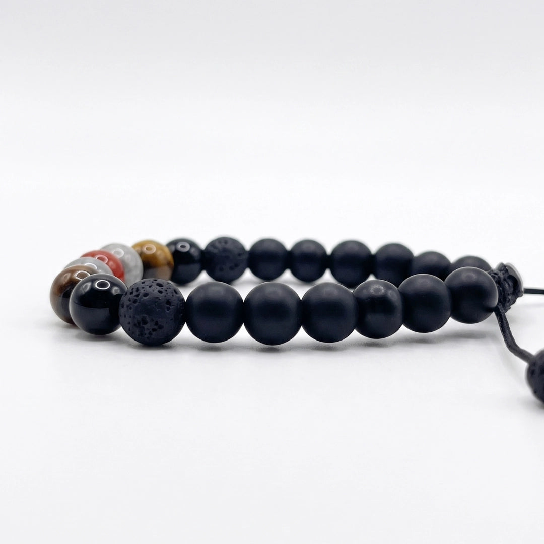 Hermosa pulsera de piedra natural con onix negro y piedra volcanica con variedad de ojo de tigre y cornalina