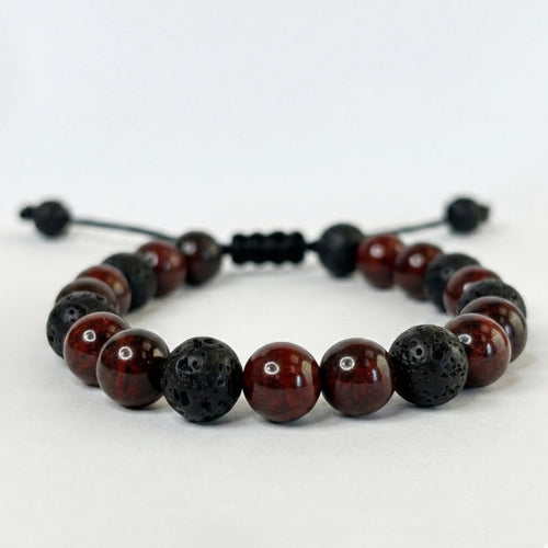 Accesorio ajustable para hombre con nudo corredizo negro y piedras rojas y negras naturales.