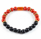 Pulsera elástica para hombre combinando cuentas de Turquesa Roja con vetas y Ónix negro profundo.